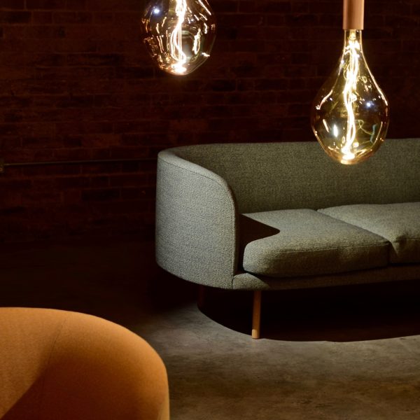 three-edison-light-bulbs-beside-the-sofa-945688